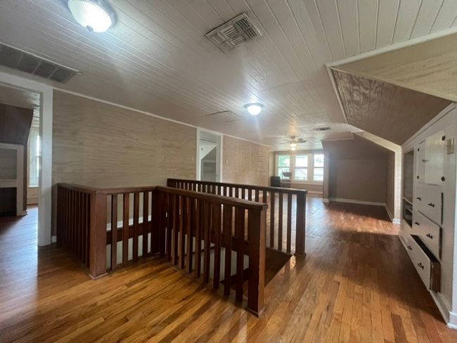 Bonus room featuring hardwood / wood-style floors, wood ceiling, and a ceiling fan | Image 25