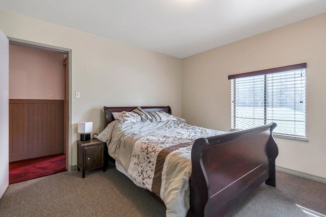 Bedroom featuring carpet floors | Image 32