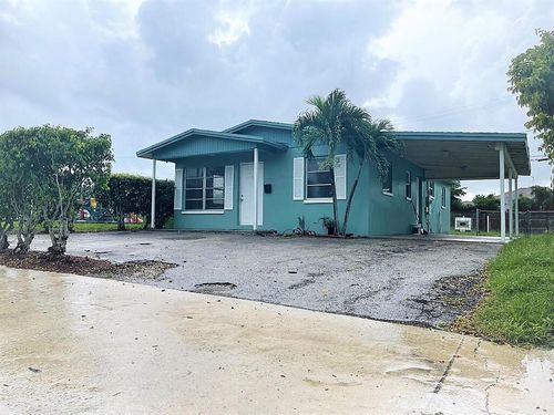 1681 W 29th St, Riviera Beach, FL, 33404-3521 | Card Image