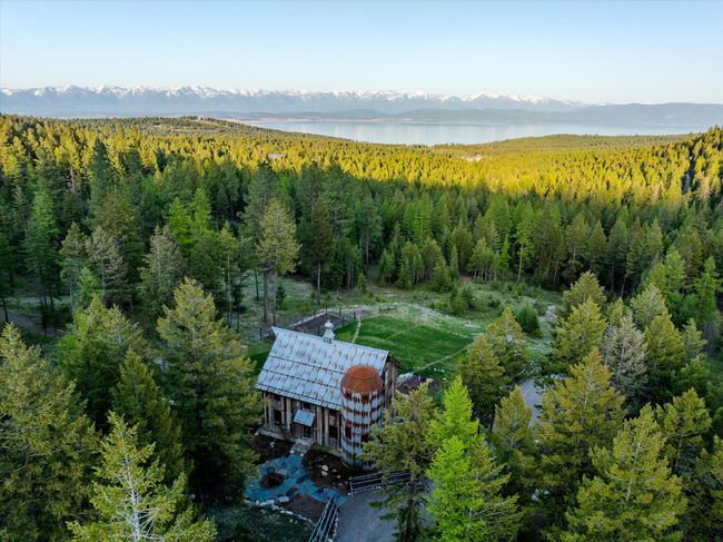 Welcome to 605 Cramer Creek Rd, Somers Mt. Humming Bird Hollow Farmstead sits above Flathead Lake on 15.6 acres. | Image 48