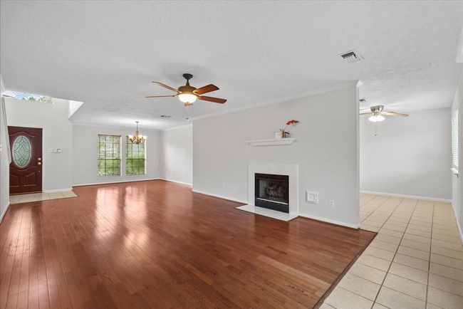 Living room with a looping layout to dining room | Image 4