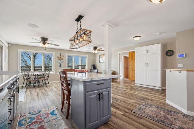 A view from the kitchen space out to the living/entertaining area. | Image 6