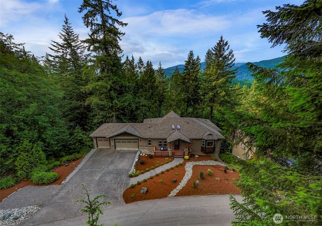 Showing the yard and flat driveway, notice the extra parking space to the left. | Image 35