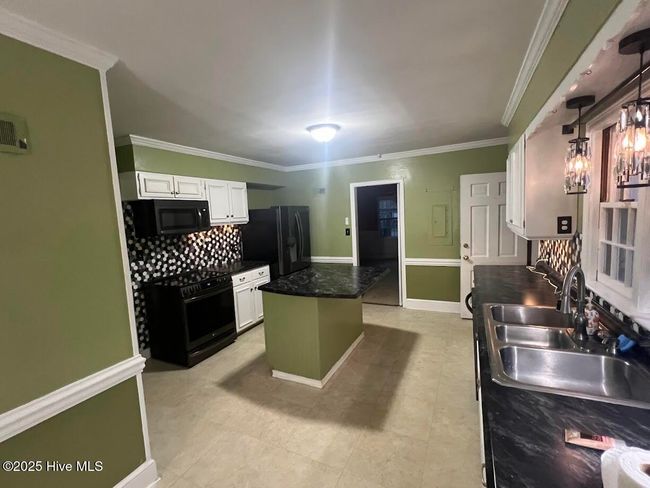 313 E 1 St Ave, House other with 3 bedrooms, 2 bathrooms and 3 parking in Chadbourn NC | Image 4