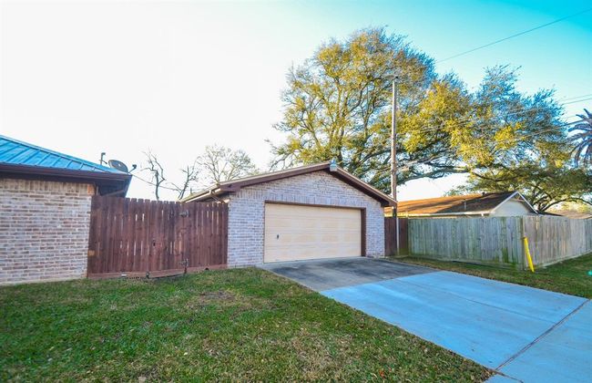 Street view of the two car detached garage | Image 25