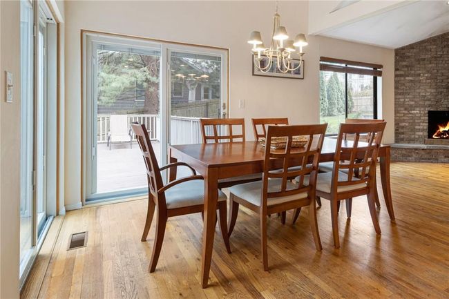 Dining room with view of deck | Image 19