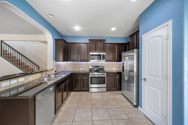 131 Kingfisher Ln, House other with 4 bedrooms, 3 bathrooms and null parking in Kyle TX | Image 4
