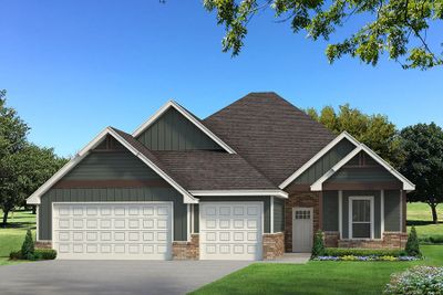 View of front facade featuring a garage and a front lawn | Image 1