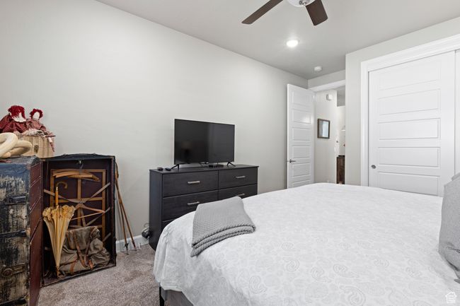 Bedroom featuring carpet and ceiling fan | Image 23