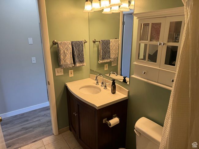 Bathroom with vanity and tile patterned floors | Image 16