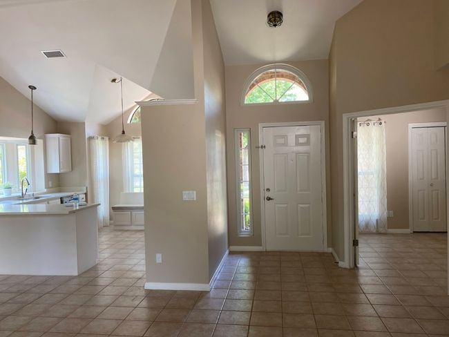 From left to right: Kitchen, Entry, Office/4th bedroom | Image 5