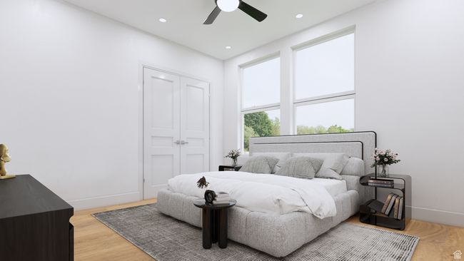 Bedroom featuring light wood-style flooring, baseboards, recessed lighting, a ceiling fan, and a closet | Image 8