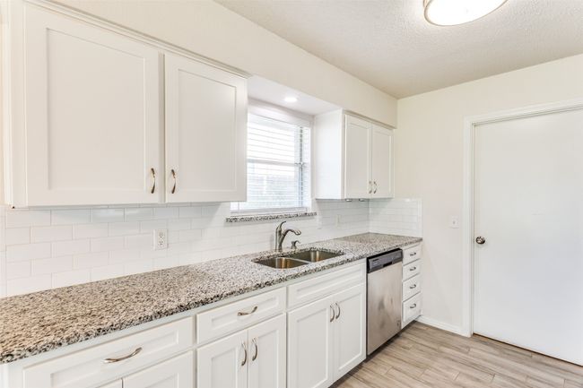 Abundant cabinets and meal prep space | Image 9