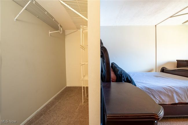Bedroom featuring carpet flooring | Image 18