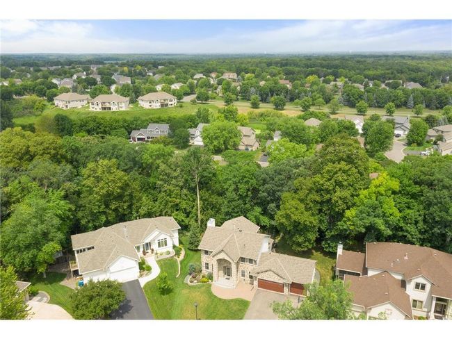 11260 Hidden Oaks Ct N, House other with 5 bedrooms, 4 bathrooms and null parking in Champlin MN | Image 42