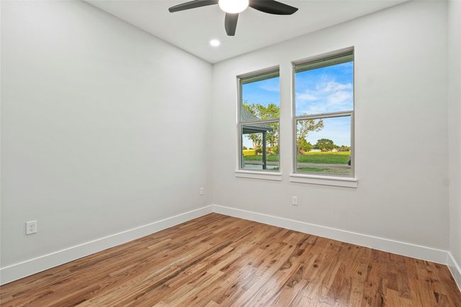 Unfurnished room featuring a ceiling fan, light wood-style flooring, and recessed lighting | Image 20