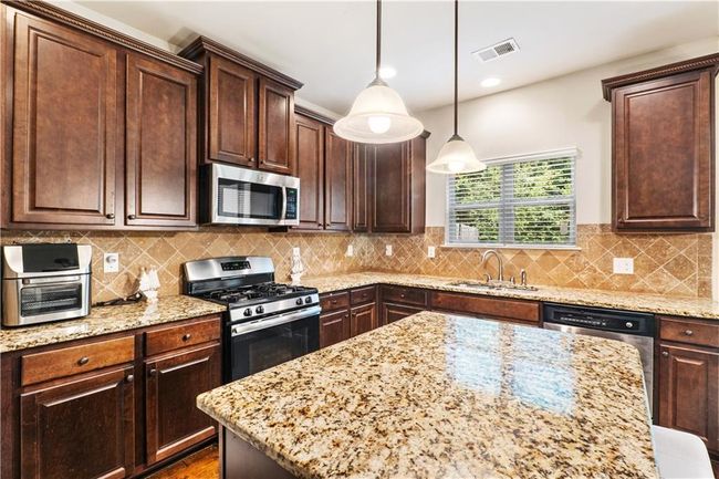 7946 White Oak Loop, House other with 5 bedrooms, 4 bathrooms and 2 parking in Stonecrest GA | Image 9