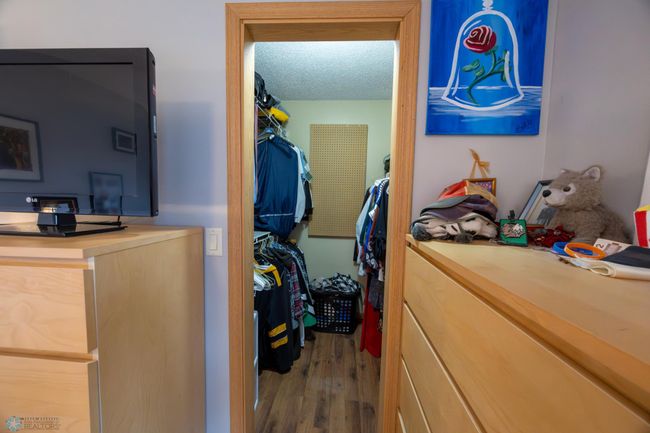 Primary Bedroom Walk-In Closet | Image 13