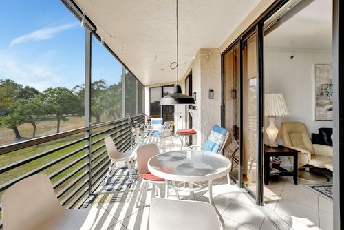 207-7100 Radice Ct, Lauderhill, FL, 33319-4282 | Card Image