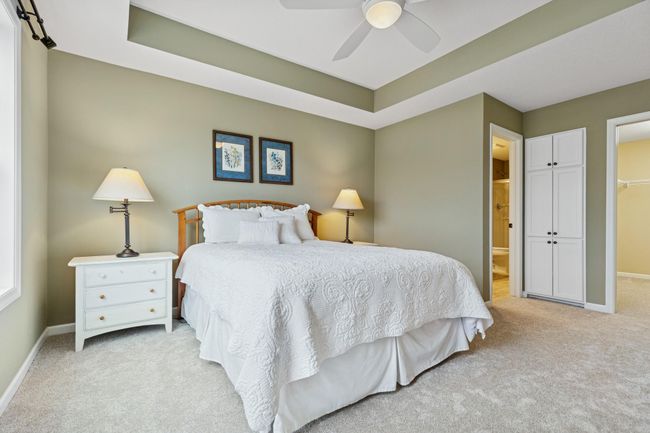 Brand new carpet on the entire upper level plus built-in cabinets in this Owner's suite. | Image 17