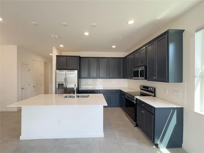 1009 Hendon Loop, House other with 4 bedrooms, 3 bathrooms and null parking in DAVENPORT FL | Image 32
