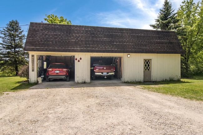 Oversized Garage with Workshop and Loft Storage | Image 35