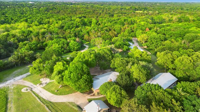 Aerial view featuring a wooded view | Image 23