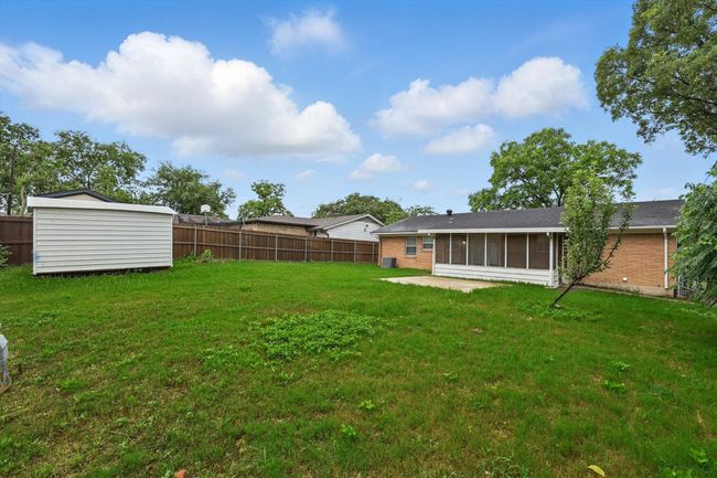 View of yard with a sunroom | Image 20