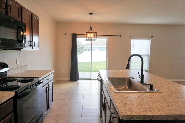 1005 Talon Lane, House other with 3 bedrooms, 2 bathrooms and null parking in Winter Haven FL | Image 5