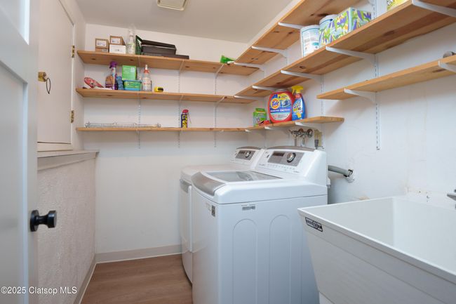 Downstairs: Full Sized W/D - maybe move the W/D to the garage....get a 1/2 bath downstairs??? | Image 22