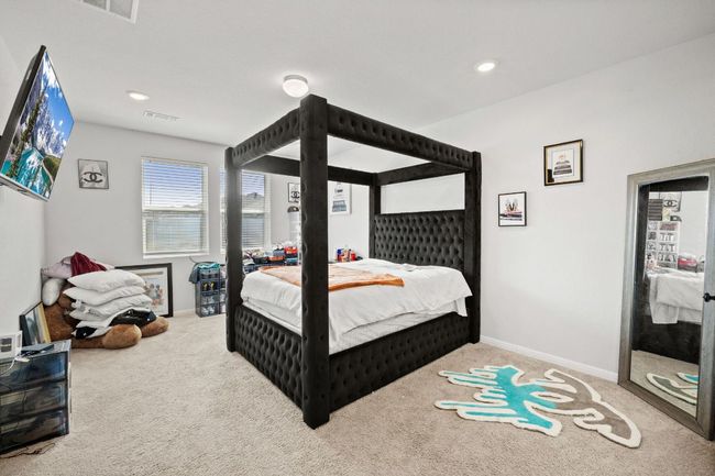 Carpeted bedroom featuring recessed lighting, visible vents, and baseboards | Image 13
