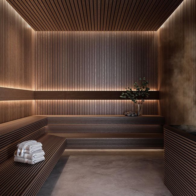 Relaxing sauna featuring concrete floors and wooden walls | Image 15