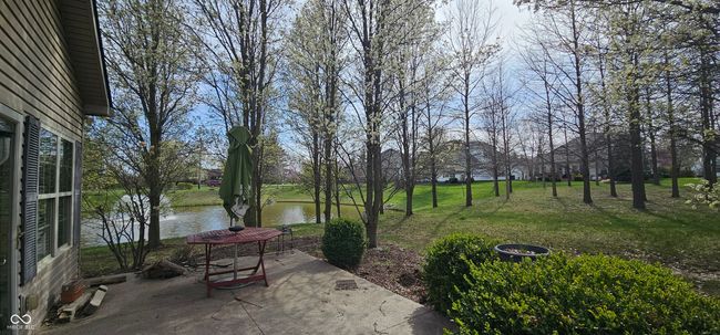 view of yard featuring a water view and a patio | Image 29