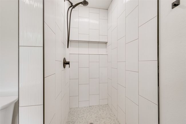 Full bath with a tile shower | Image 25