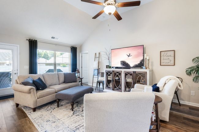 Spacious family room and beautiful floors through out. | Image 8