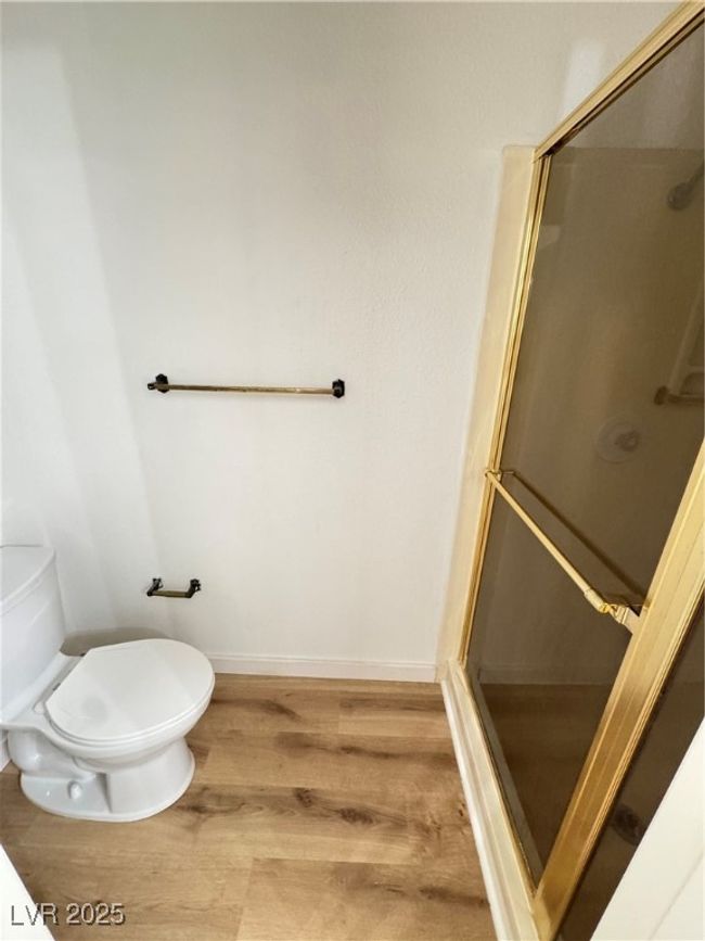 Full bath featuring wood finished floors and a shower stall | Image 27