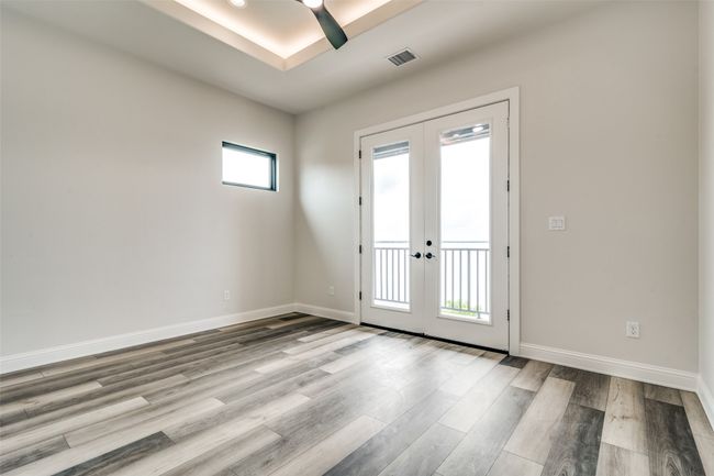 Entryway with ceiling fan, french doors, and wood-type flooring | Image 23