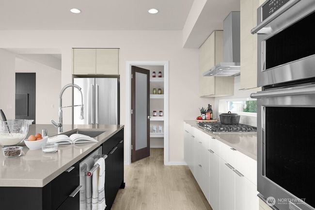 Gourmet Kitchen with supersized island, European inspired cabinetry and Stainless Steel, energy efficient appliances. Facade, Ext Colors, Interior Photos & Floor Plans for illustrative purposes only. Actual Facade, Ext Colors, Interiors & Floor Plans may differ. | Image 6