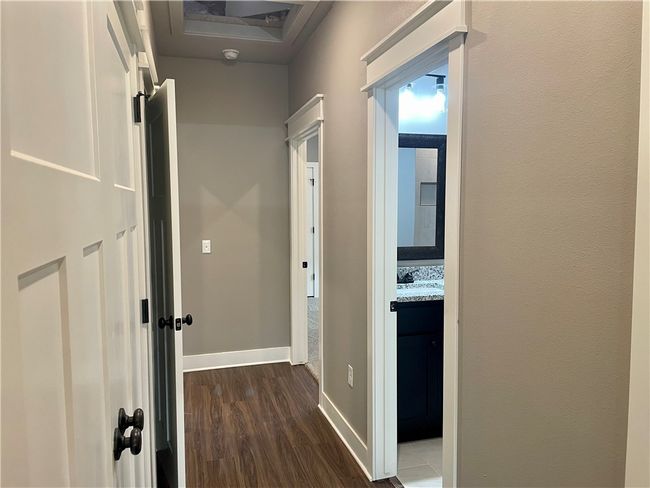 Hall leading from bonus to bedrooms | Image 38