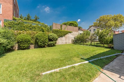 7107 Ditmars Blvd, East Elmhurst, NY, 11370-1035 | Card Image