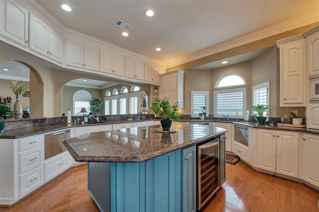 View of kitchen featuring a large island. Almost everything in this house is large! So much space here. | Image 6