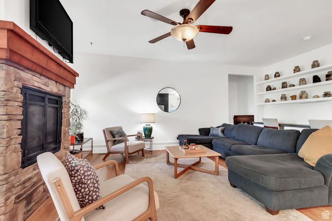 Main level living room with gas fireplace | Image 19