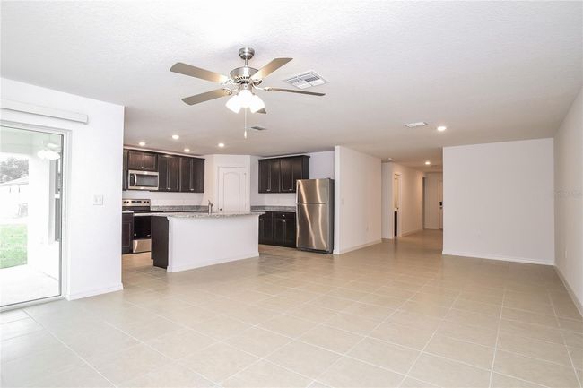 1660 Gopher Tree St, House other with 5 bedrooms, 3 bathrooms and null parking in Mascotte FL | Image 4