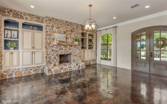 Gorgeous fireplace with tons of builtins. | Image 5