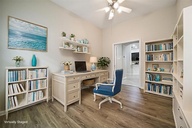 Another view of this room shows the pocket doors which allow for wall space from every angle. So functional! | Image 22