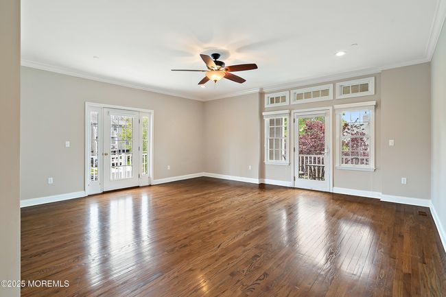 Family/Living room w/balcony facing west | Image 30
