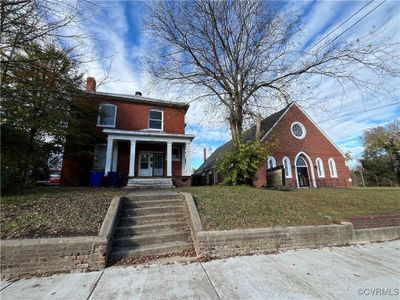 View of front of property with a front yard and a porch | Image 2