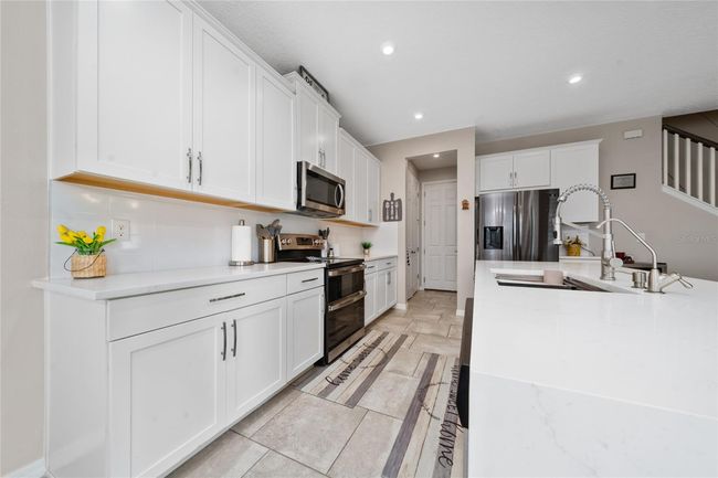 2424 Varenna Loop, House other with 3 bedrooms, 3 bathrooms and null parking in KISSIMMEE FL | Image 24