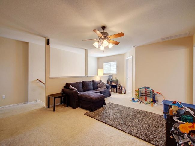 Staged earlier. Carpet replaced with Laminate flooring | Image 22