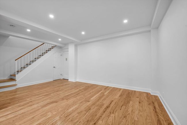 Basement featuring stairway, recessed lighting, and light wood-style floors | Image 4